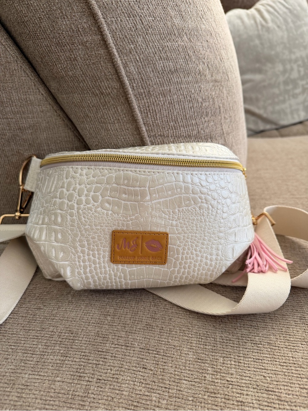 White Croc-Embossed Belt Bag with Pink Tassel
